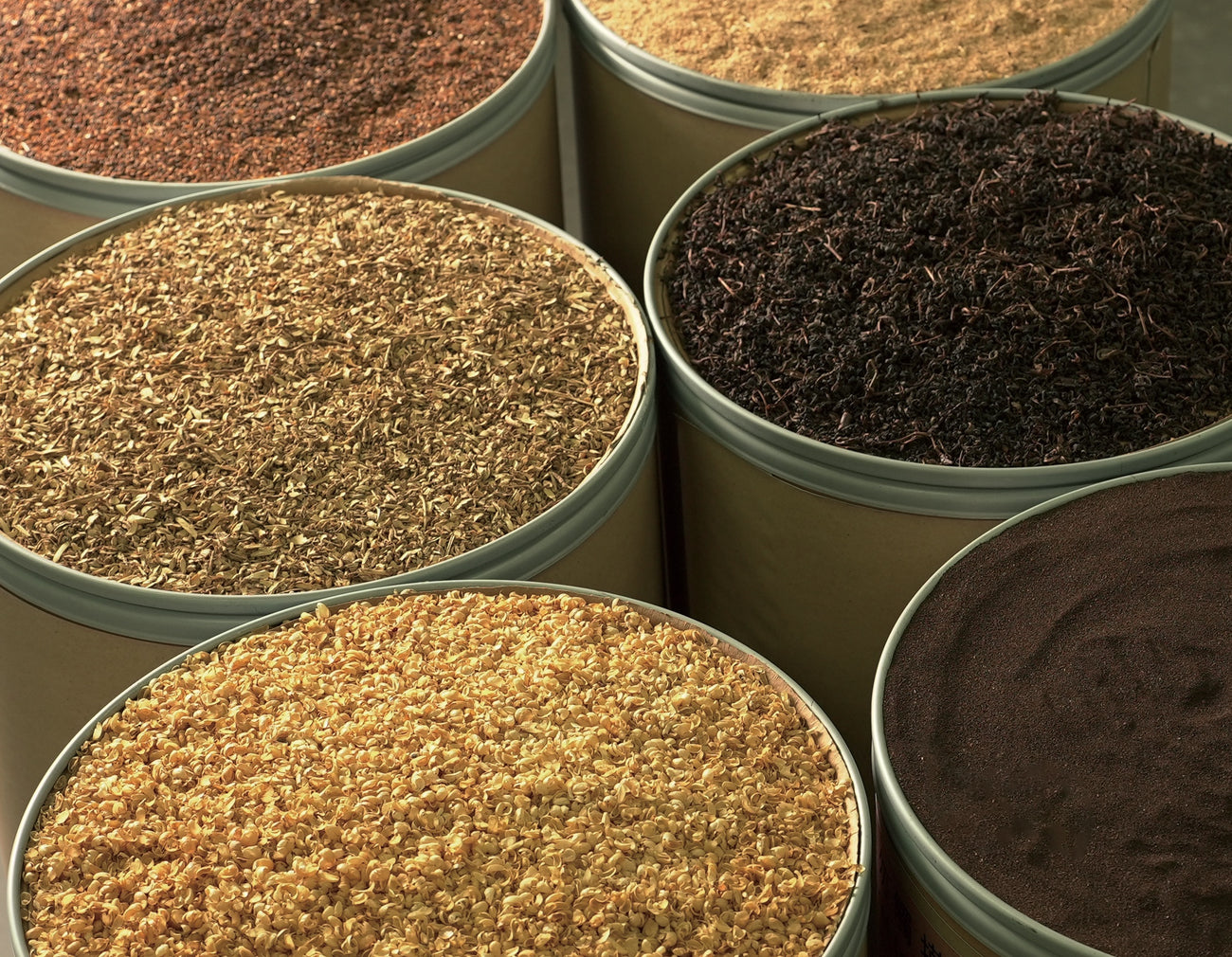 Drums of raw botanicals: loose teas, husks and seed powders