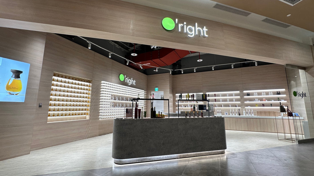 O'right flagship salon counter with a backlit bottle wall